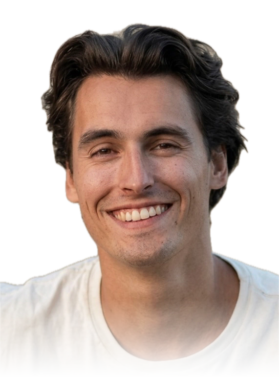 Anton Brunel, smiling, in a light t-shirt